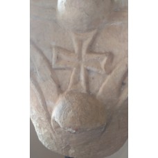 Capital of pillar design, cross on top of a sphere